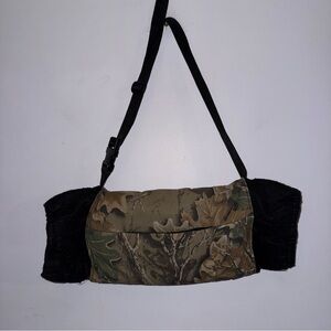 camouflage hand warmer muff hunting accessory designed to keep hands warm in col